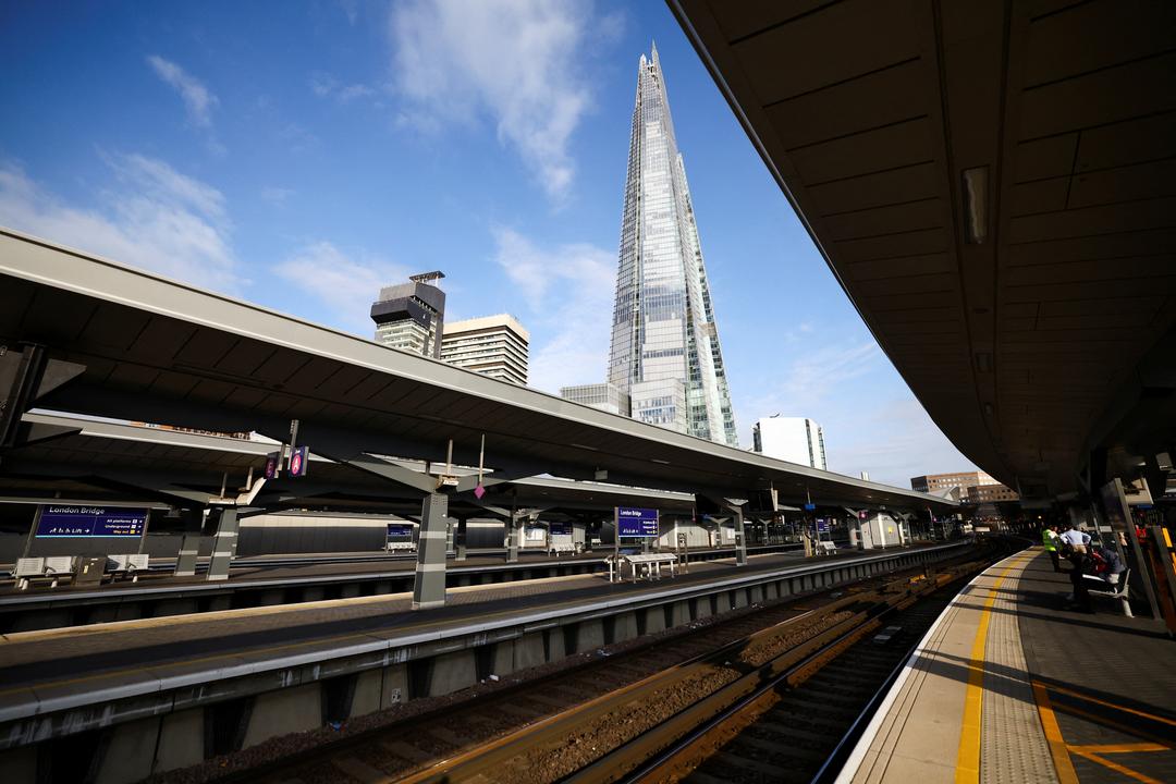 British rail workers strike over pay dispute, in London